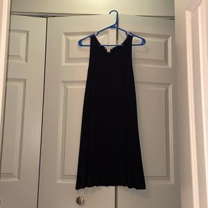 100% viscose, black dress from H&M with side pockets. Stretchy and comfortable.